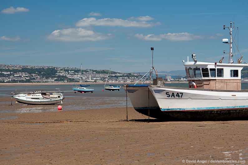 Image of Swansea Bay with fishing boats at low tide